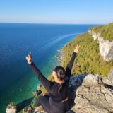 Girl sitting at Lion's Head Lookout Point
